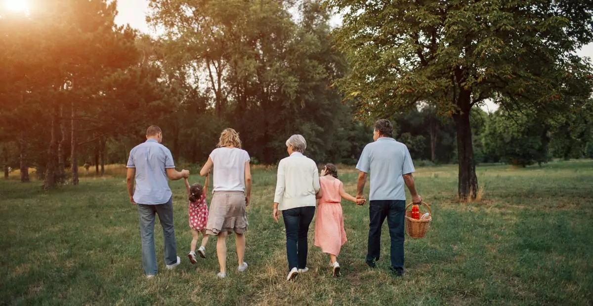 intergenerational group walking
